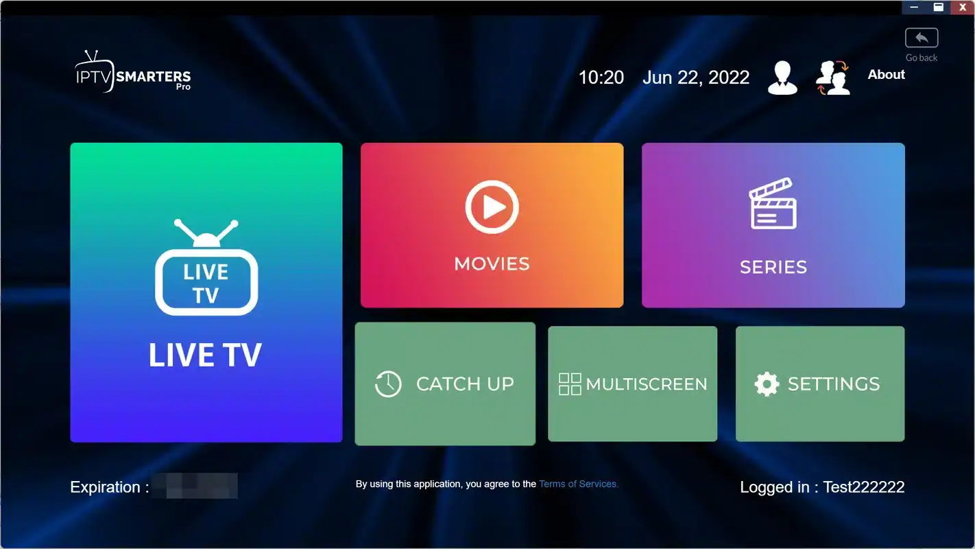 IPTV player open on a tablet next to a TV remote control